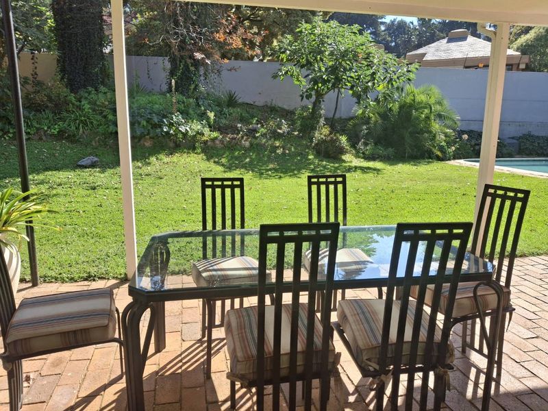 A BEAUTIFULLY MAINTAINED FOUR BEDROOM HOUSE - Photo 1