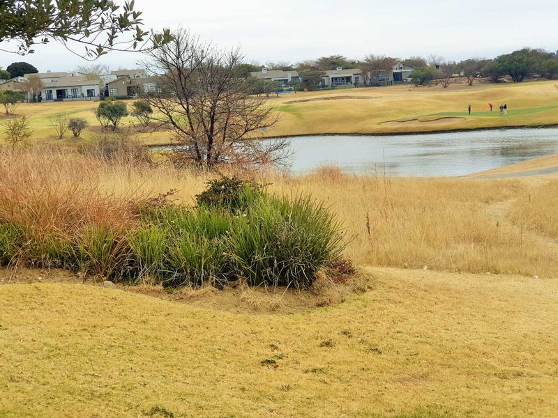 Oasis Retreat in a Prestigious Golf Estate - Photo 1