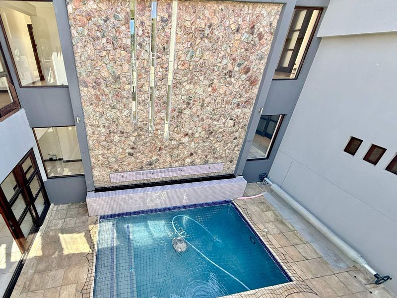 Luxury Awaits: Unfurnished 5 Bedroom Gem in Waterstone Estate! - Photo 2