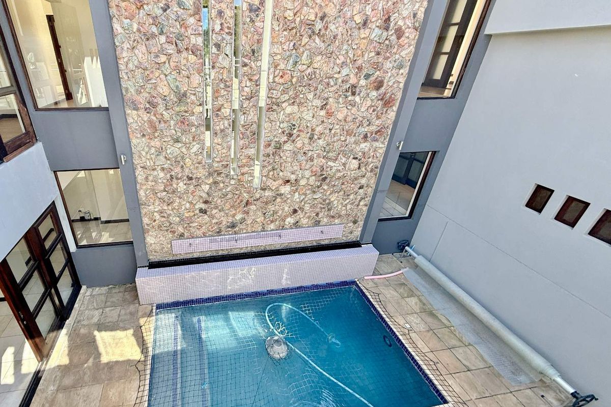 Luxury Awaits: Unfurnished 5 Bedroom Gem in Waterstone Estate! - Photo 2