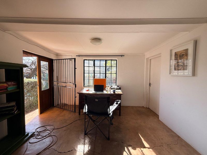 Charming 2-Bed Home with Two Bonus Units for Extra Income - Photo 9