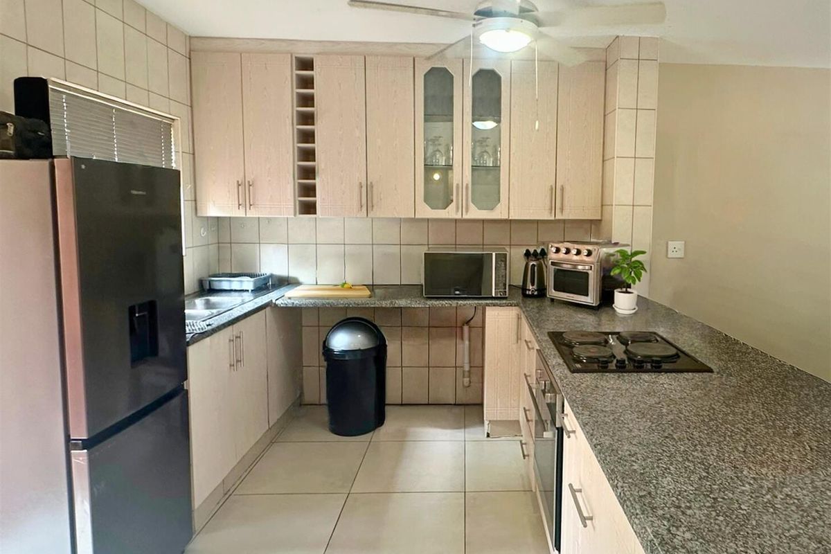 Spacious 2-Bedroom Unit with Patio - Photo 4