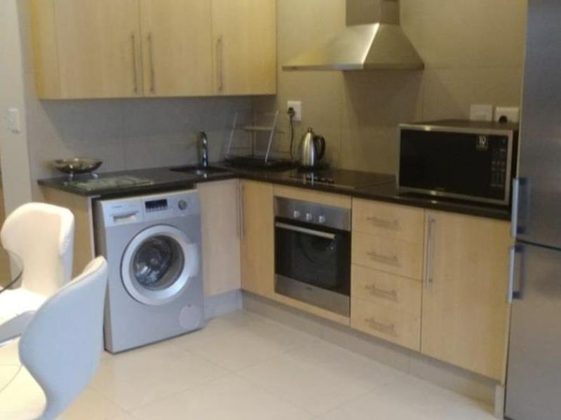 A MODERN ONE BEDROOM FURNISHED APARTMENT - Photo 6