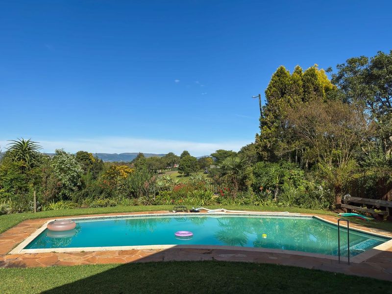 Spacious Family Home with Cottage, Tennis Court & Great Views in Howick North - Photo 6