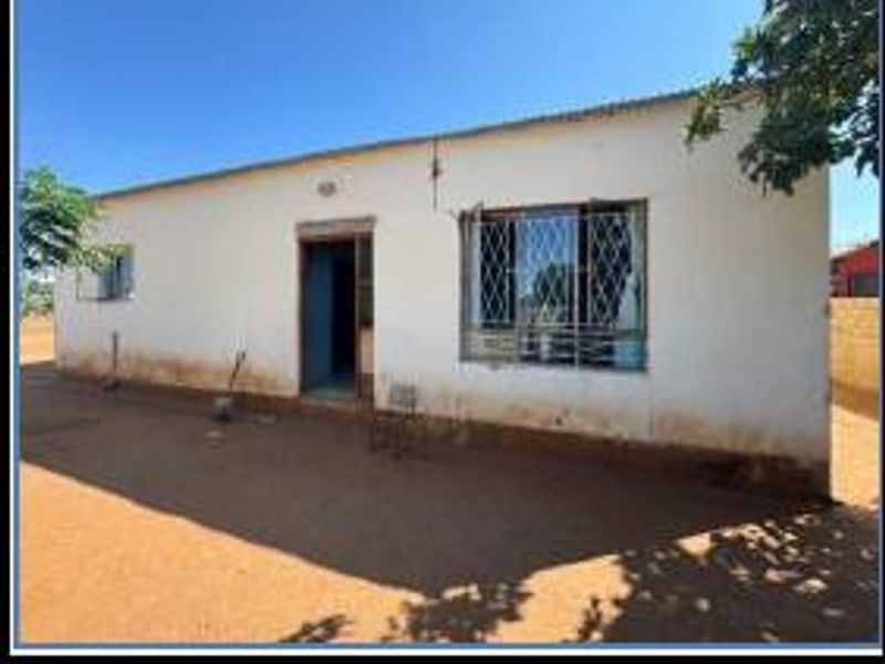 Charming Three-Bedroom Gem Awaits Your Touch - Photo 2