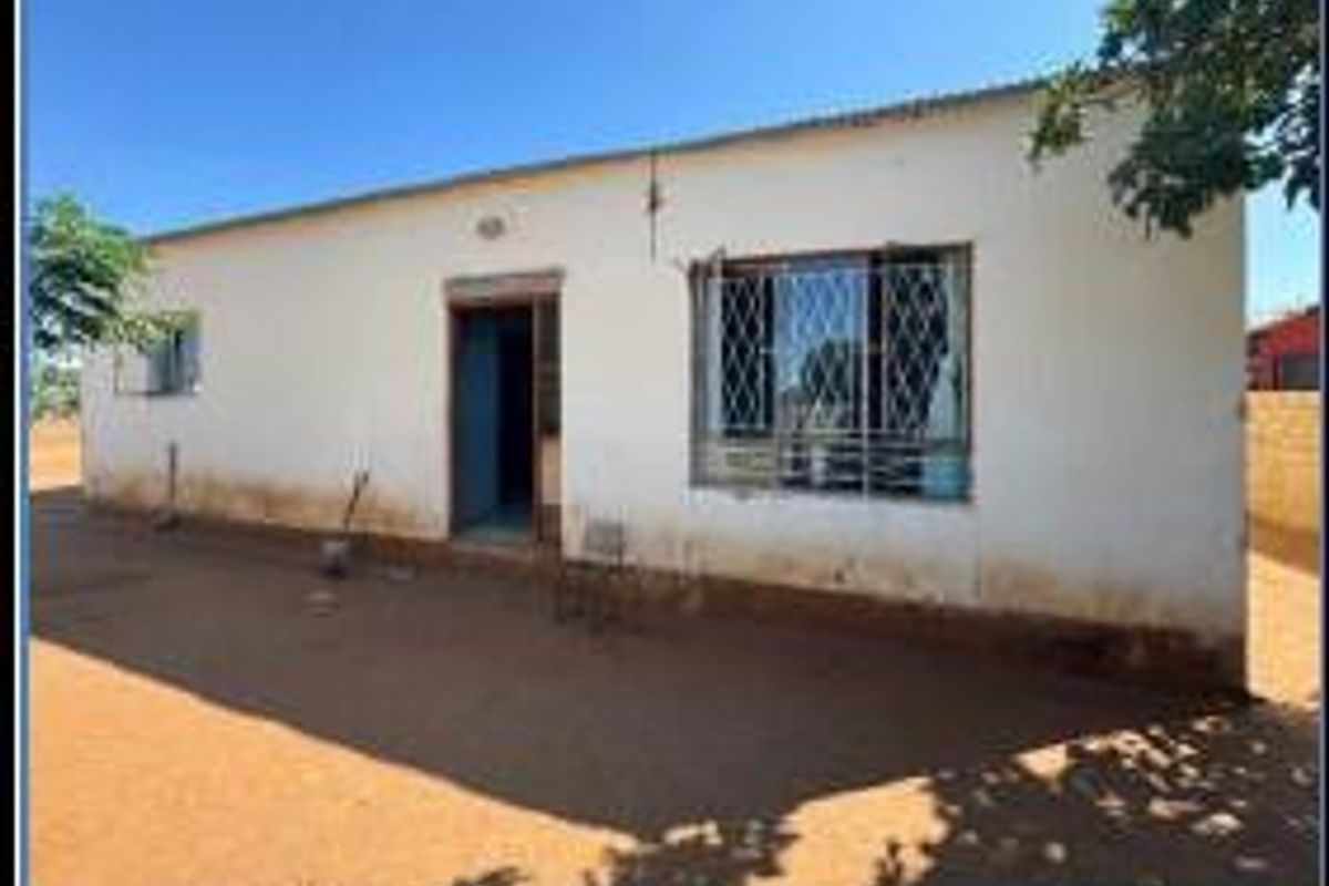 Charming Three-Bedroom Gem Awaits Your Touch - Photo 2