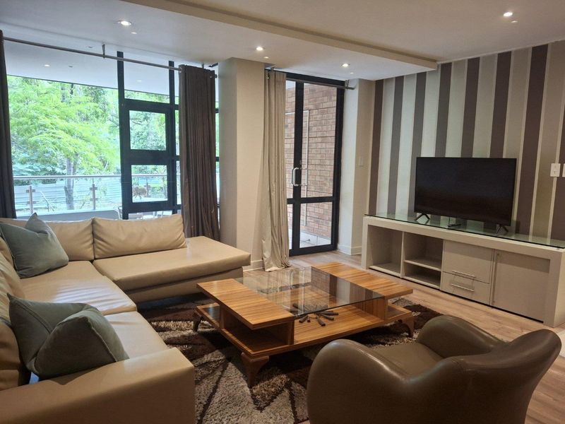 A BEAUTIFULLY FURNISHED TWO BEDROOM APARTMENT - Photo 2
