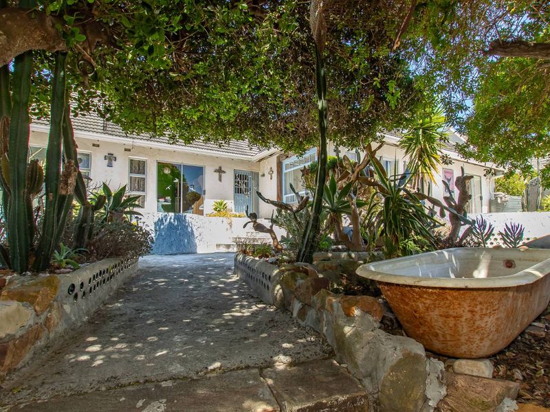 Charming Family Home with Spacious Design and Farmhouse Charm - Photo 3