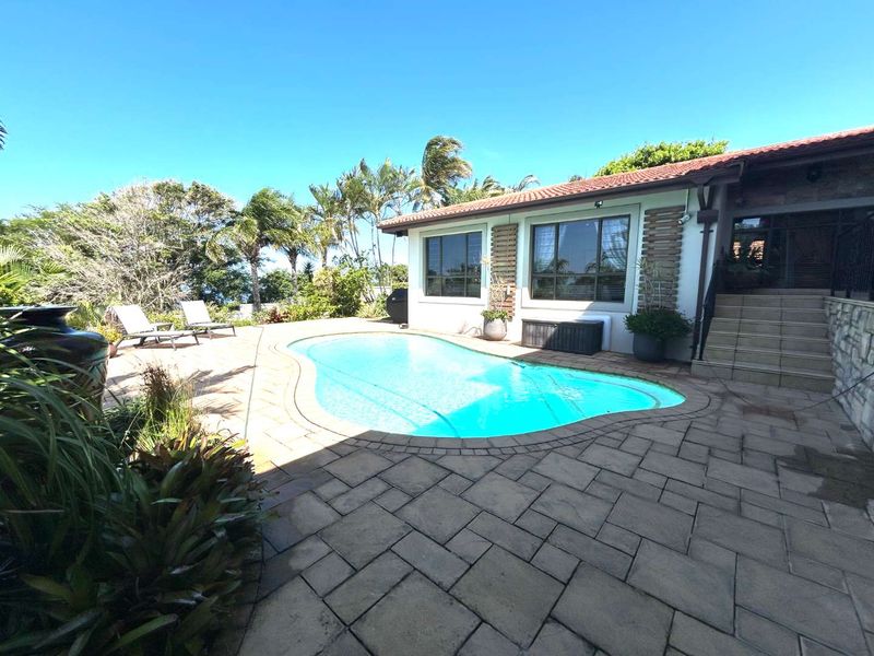 HENDRA IMMACULATE SPACIOUS 4 BEDROOM HOME WITH STUNNING SEA VIEWS - Photo 3