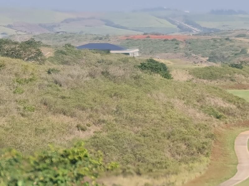 A scenic view of the surrounding landscape and golf course infrastructure.