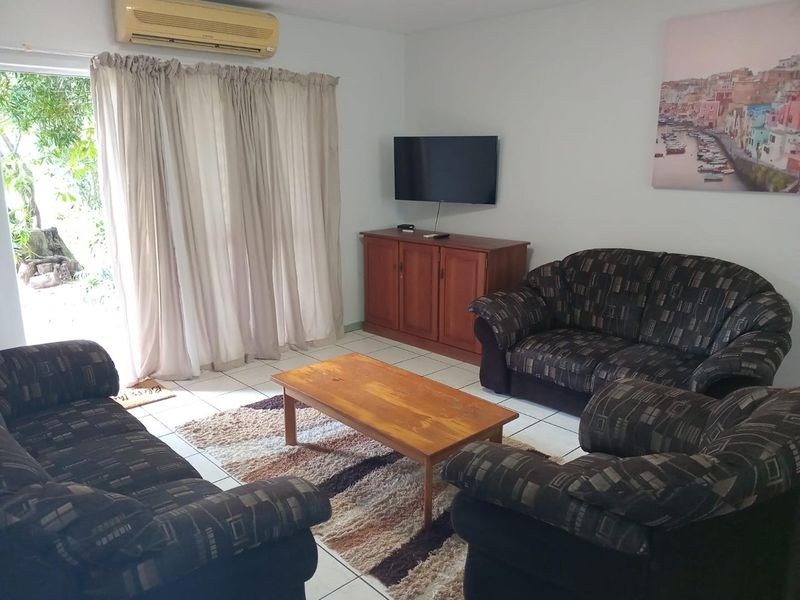 Charming 2-Bedroom Simplex with Modern Comforts & Complex Pool - Photo 8