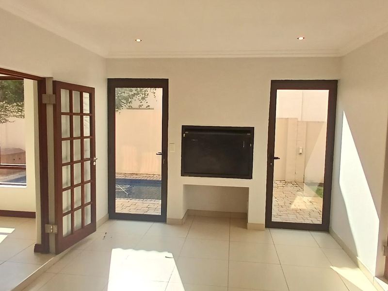 Modern Elegance in a Secure and Sought-After Estate - Photo 8