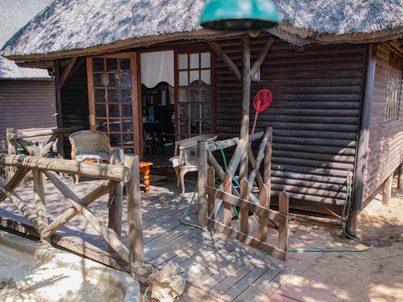 Charming Turnkey Investment – Character-Filled Thatch Roof Home - Photo 3