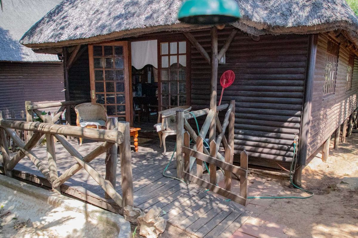 Charming Turnkey Investment – Character-Filled Thatch Roof Home - Photo 3