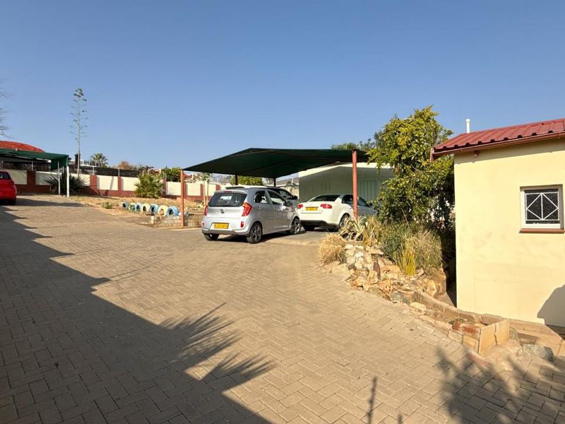 Set high above street level on a massive erf with a large front garden and elevated views - Photo 4