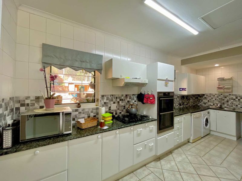 **Charming 3-Bedroom Home with Separate Flatlet, Backup Power, and Low Levies in Faeriedale Security Village, Faerie Glen** - Photo 3