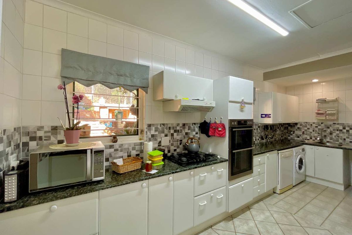 **Charming 3-Bedroom Home with Separate Flatlet, Backup Power, and Low Levies in Faeriedale Security Village, Faerie Glen** - Photo 3