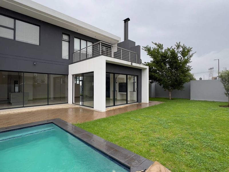 Modern Architectural Gem with Versatile Living & Expansive Balcony in Midstream Meadows - Photo 4