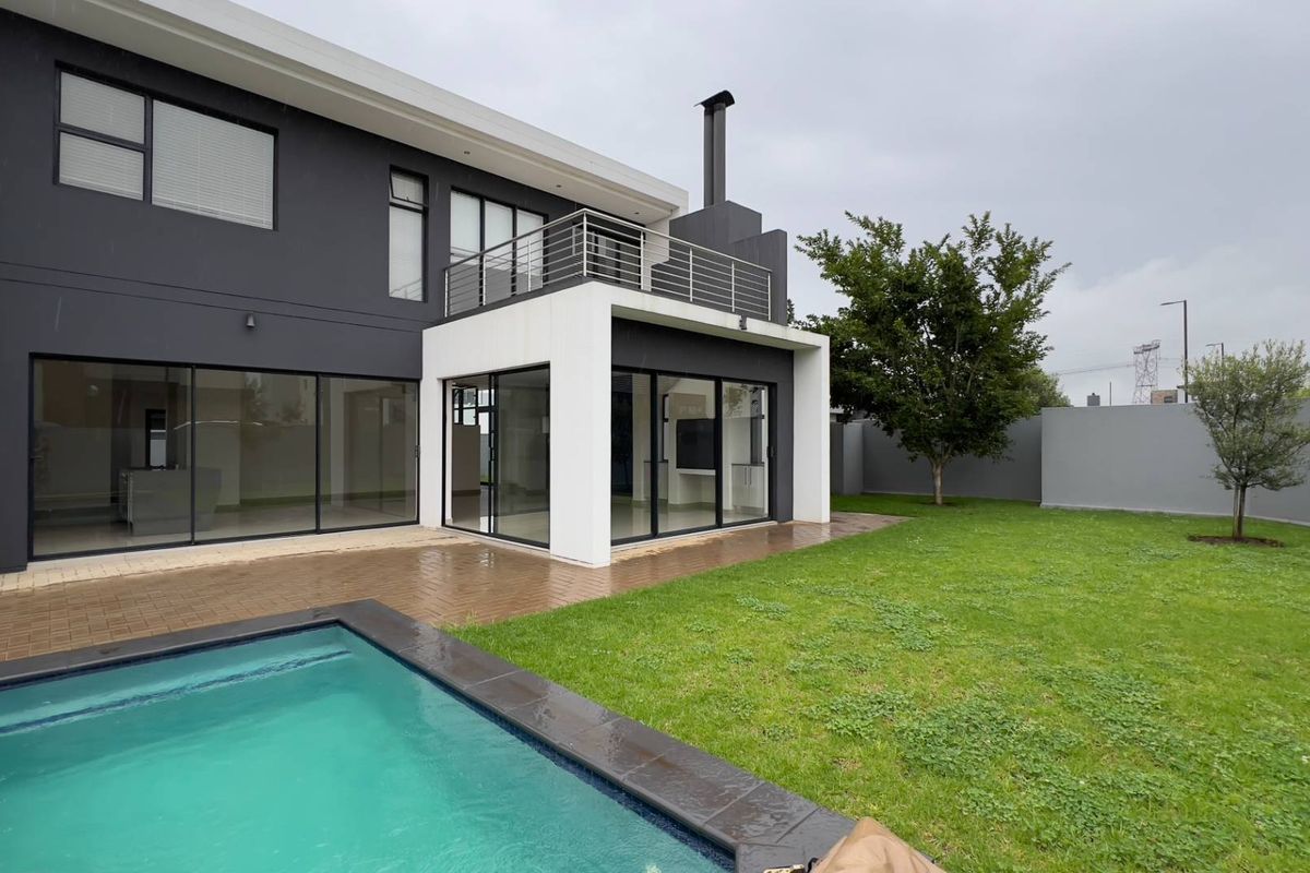 Modern Architectural Gem with Versatile Living & Expansive Balcony in Midstream Meadows - Photo 4