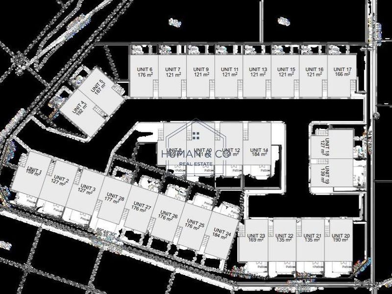 A comprehensive site plan showing the layout and unit distribution of the townhouse complex.