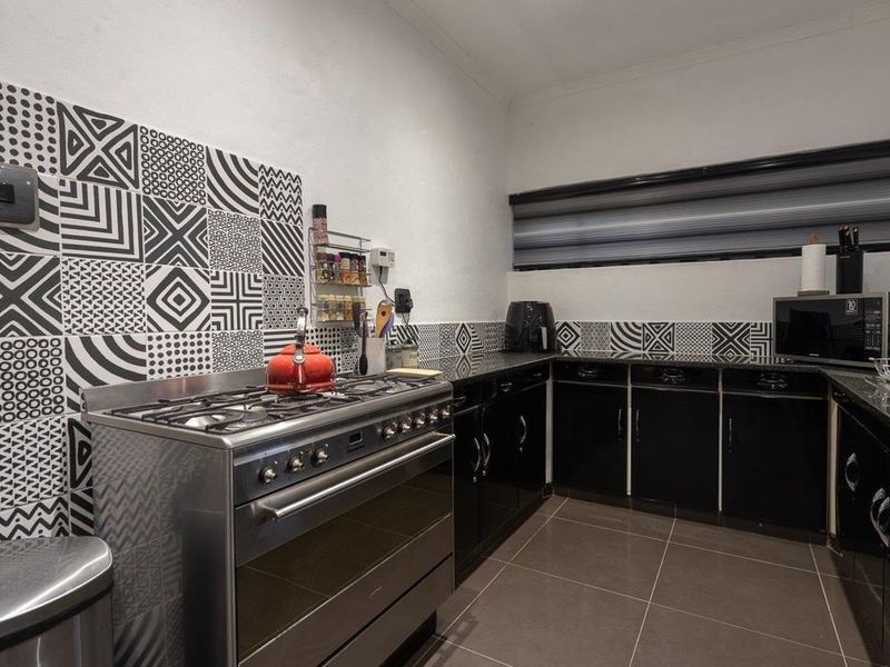 Secure Family Living with Pool and Spacious Garaging - Photo 6