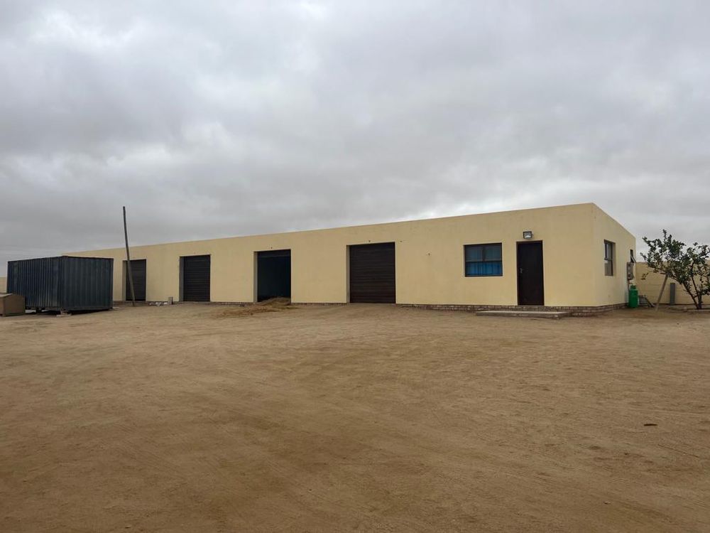 Garages, workers rooms and flat 2