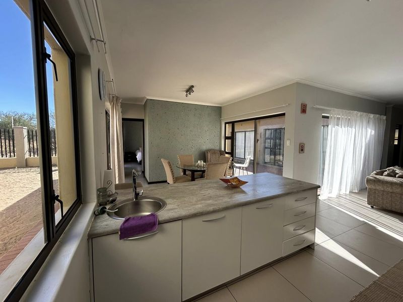 Discover this inviting 3-bedroom unit nestled in a secure gated community, offering comfort and space in a prime location. - Photo 3