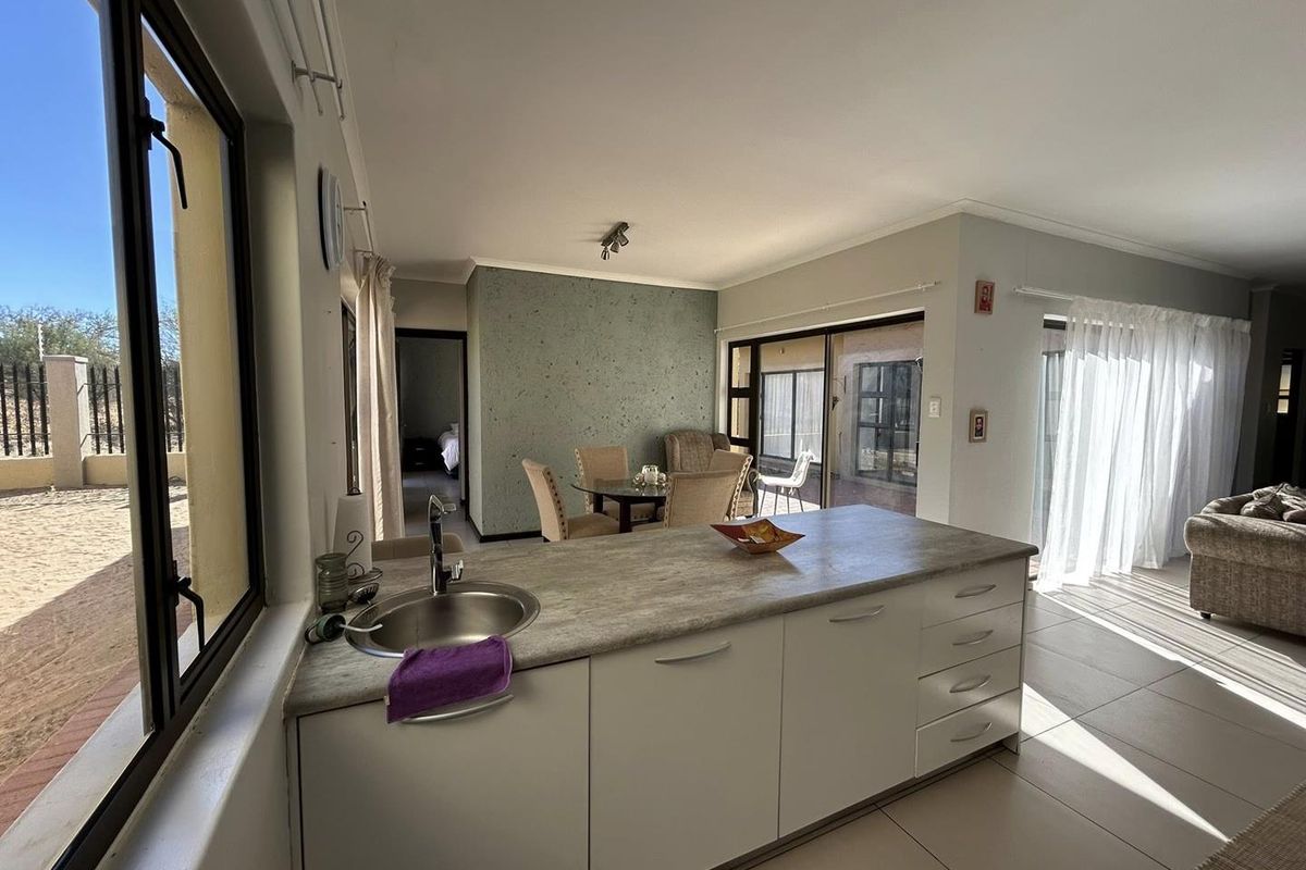 Discover this inviting 3-bedroom unit nestled in a secure gated community, offering comfort and space in a prime location. - Photo 3