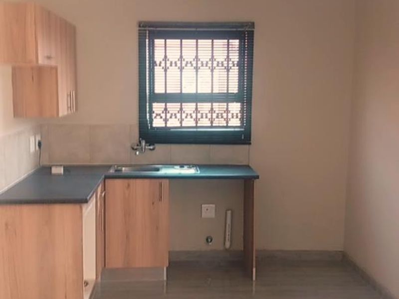 3-Bedroom Home To Let in Secure Boomed-Off Area with Biometric Access – Dawn Park – R7,000 per Month This well-maintained three-bedroom home - Photo 3