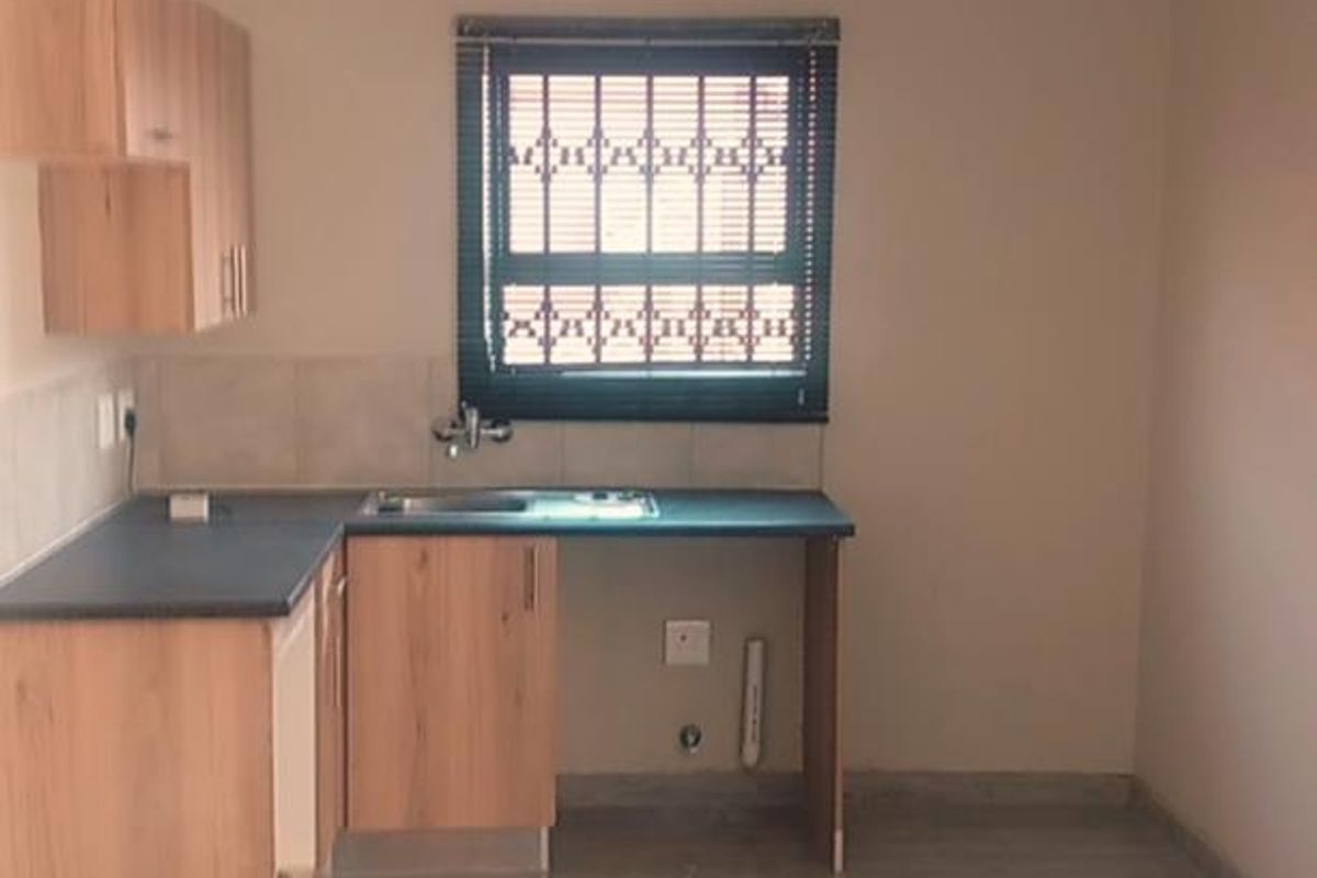 3-Bedroom Home To Let in Secure Boomed-Off Area with Biometric Access – Dawn Park – R7,000 per Month This well-maintained three-bedroom home - Photo 3