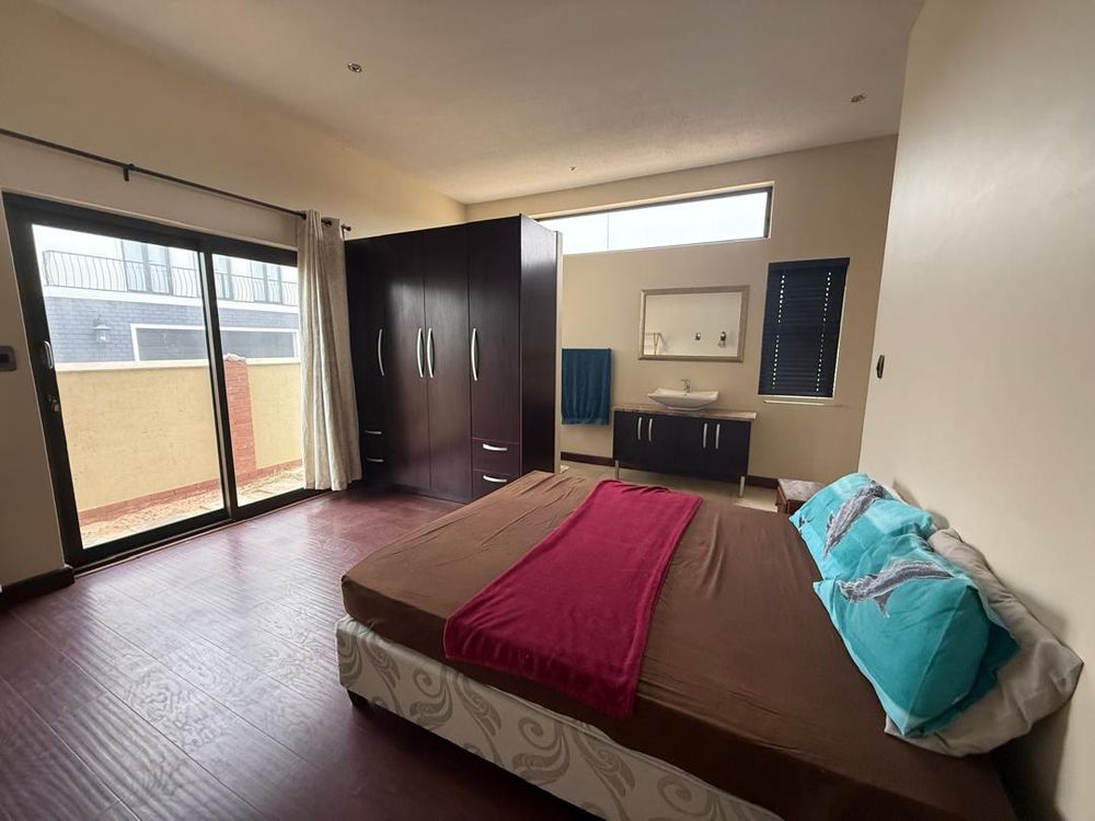 Ground floor, bedroom one, built-in cupboards and en-suite bathroom