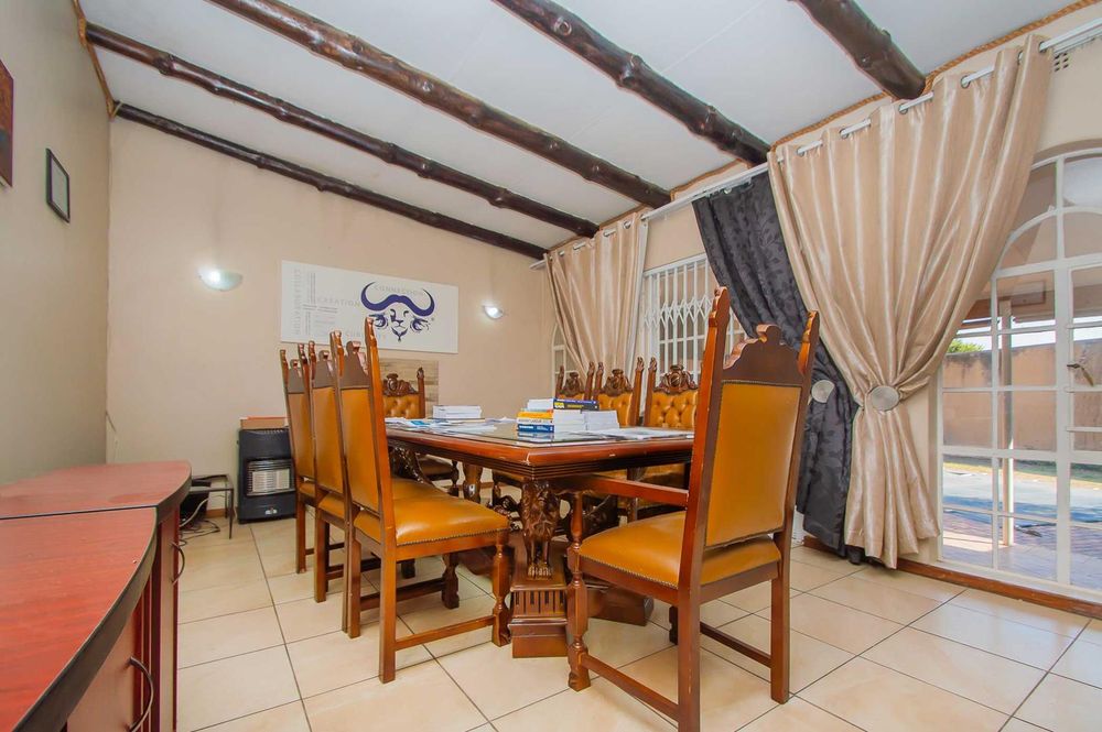Dining with french doors out to patio 