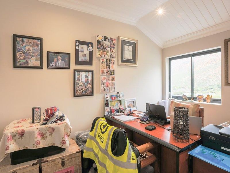 Stunning Family Home with Panoramic Mountain Views and Income-Generating Cottage - Photo 6