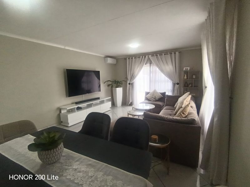 1. "Discover Your Dream Home in Mackenzie Palms!" 2. "Luxurious Living Awaits in This 3-Bedroom Gem!" 3. "Modern Comfort Meets Security in Mackenzie Palms!" 4. - Photo 4