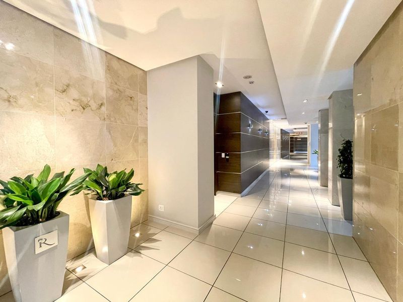 Experience Unparalleled Luxury Living in the Heart of Sandton with this exquisite fully furnished upmarket apartment. - Photo 4