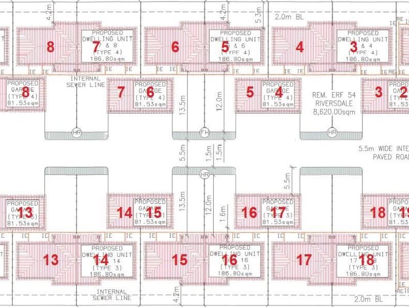Architectural site plan showing the layout of proposed dwelling units, garages, and internal paved roads for the development.