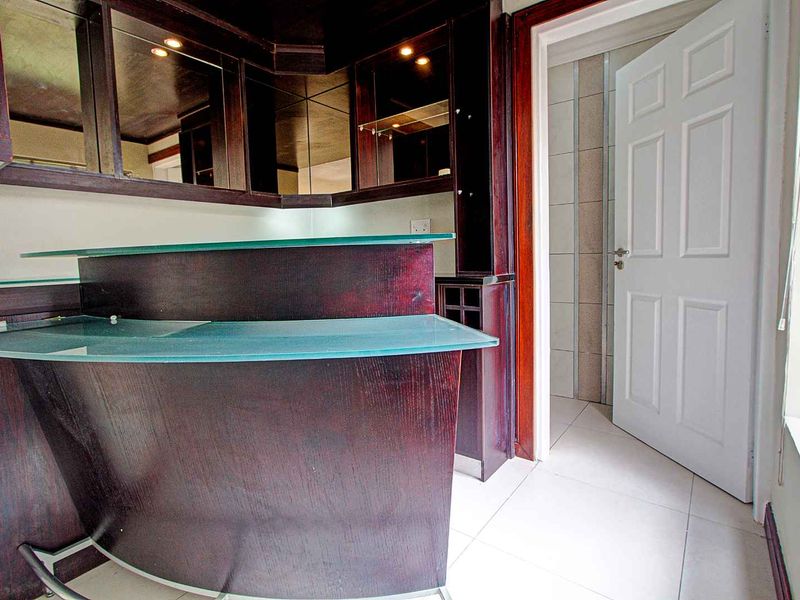 Luxurious Freestanding Home with Modern Finishes and Poolside Oasis - Photo 9