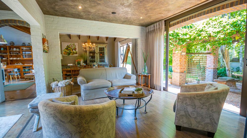 Family and TV room, widely opens to outside