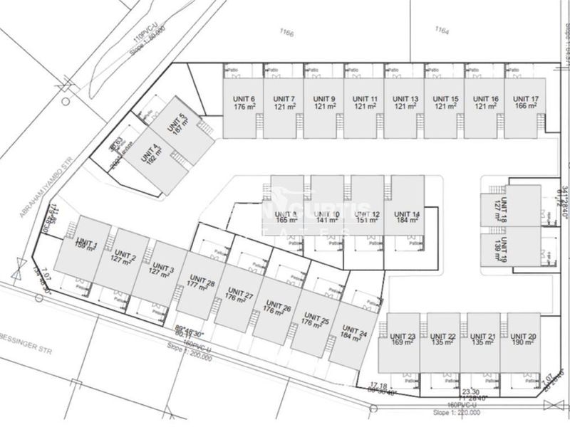 Site plan showing the layout and unit distribution of the townhouse development, including individual unit sizes and patio locations.