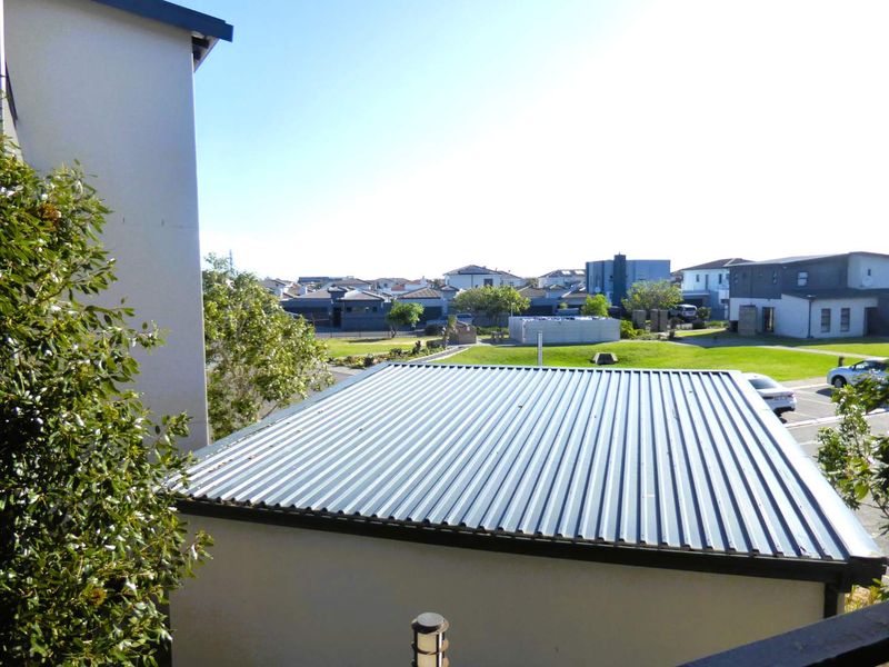 An elevated view overlooking the surrounding residential neighbourhood and rooftops.