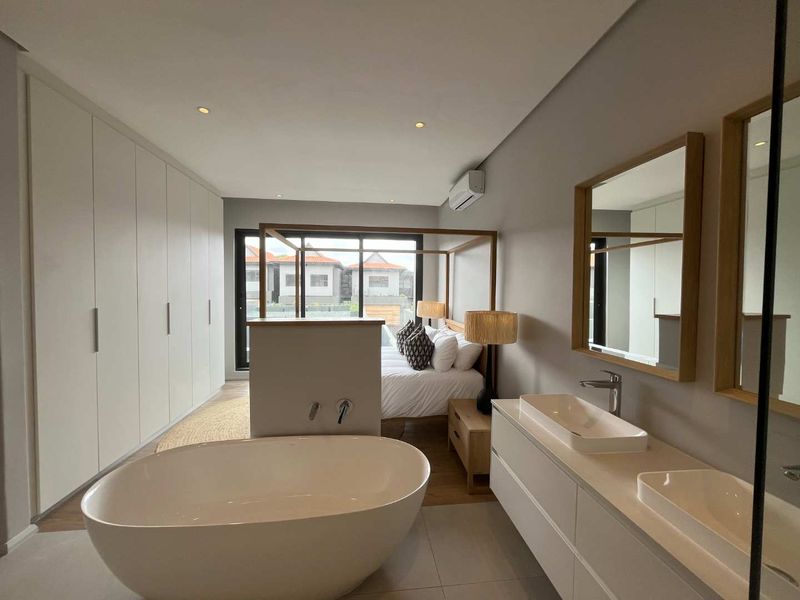 Experience luxury coastal living in this modern 3-bedroom duplex villa at the prestigious Zimbali - Photo 7