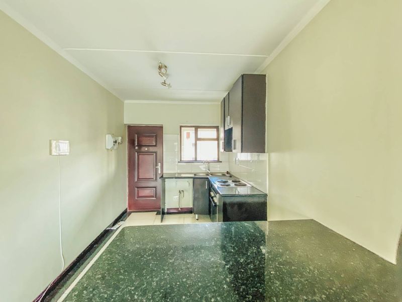 Spacious 2-Bedroom Home with Covered Parking in Secure Estate - Photo 6
