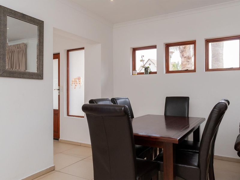 Lovely 3-bedroom facebrick home with a pool situated in a secure estate in Glen Marais - Photo 10