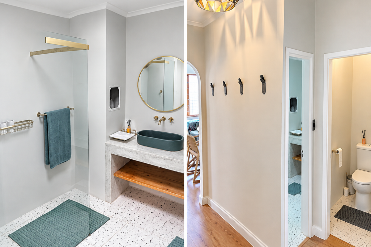 Modern bathroom featuring a glass-enclosed shower, stone vanity with a vessel sink, and terrazzo flooring, adjacent to a separate toilet area.
