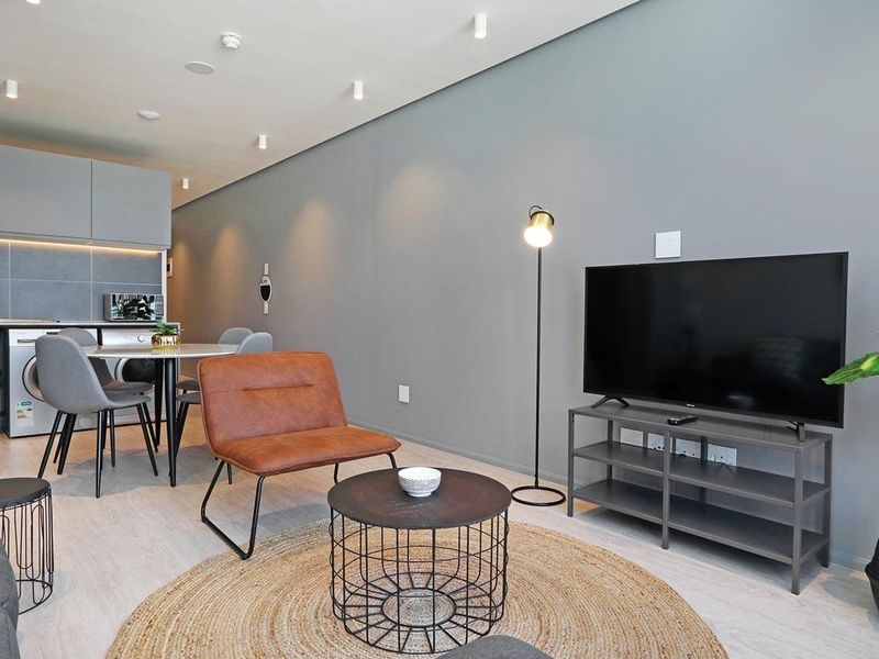 Experience City Living with a Serene Mountain Backdrop - Photo 8