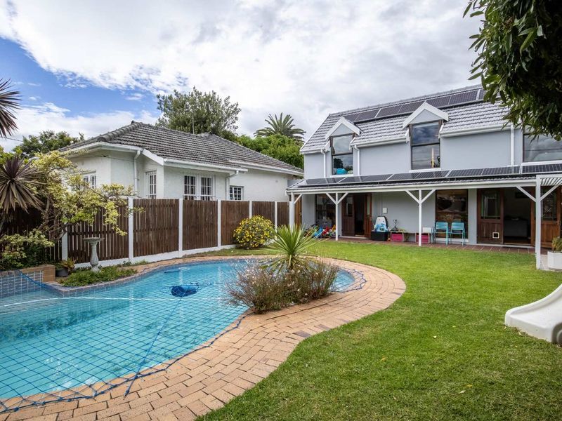 Charming North-Facing Double-Storey Home with Sunny Garden & Pool - Photo 3