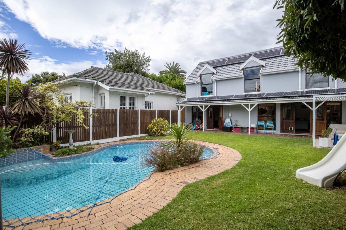 Charming North-Facing Double-Storey Home with Sunny Garden & Pool - Photo 3
