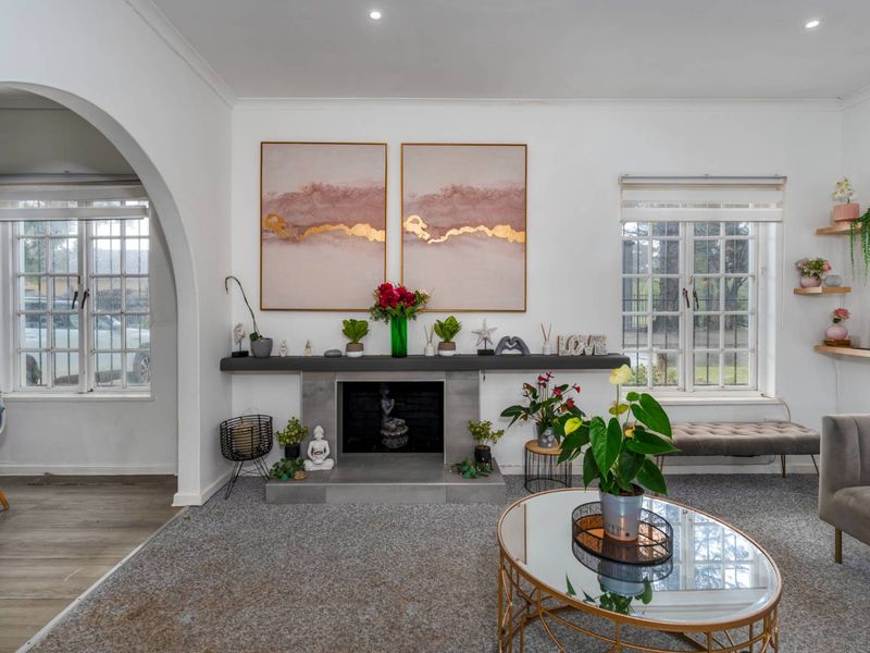 Delightfully spacious and loved family home adorned by lovely secure and established sunny garden plus built-in Braai area - this is a must see! - Photo 2