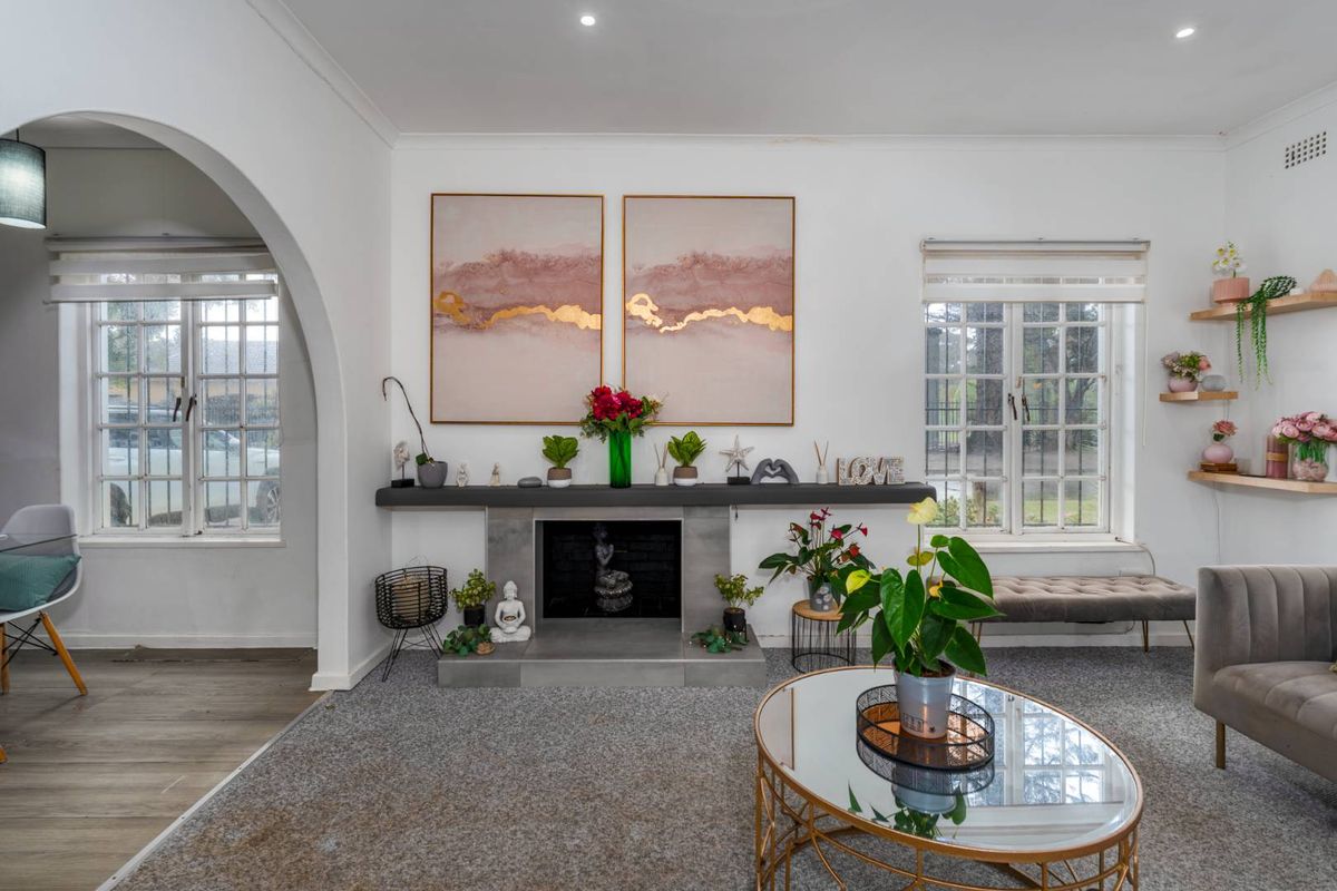 Delightfully spacious and loved family home adorned by lovely secure and established sunny garden plus built-in Braai area - this is a must see! - Photo 2
