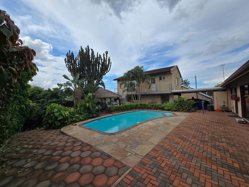 Your Dream Suburban Oasis Awaits in Escombe! - Photo 1